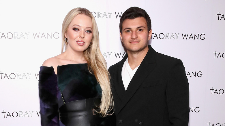 Tiffany Trump and Michael Boulos posing