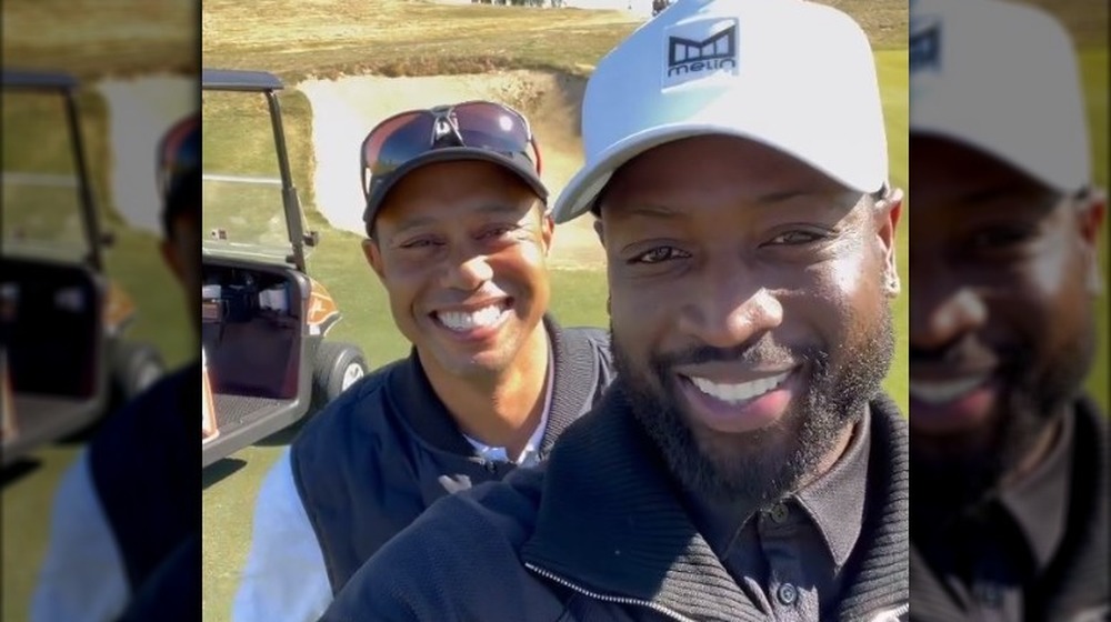 Dwyane Wade Tiger Woods smiling