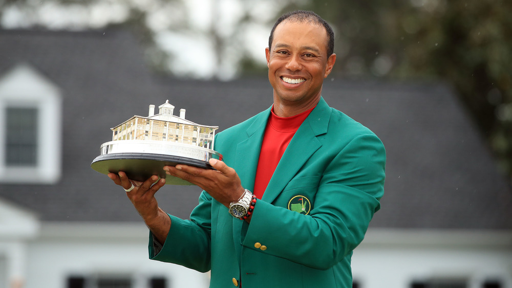 Tiger Wood posing in his green Masters jacket