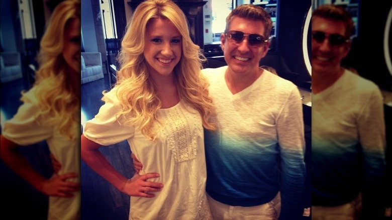 Todd Chrisley wearing sunglasses with daughter Savannah