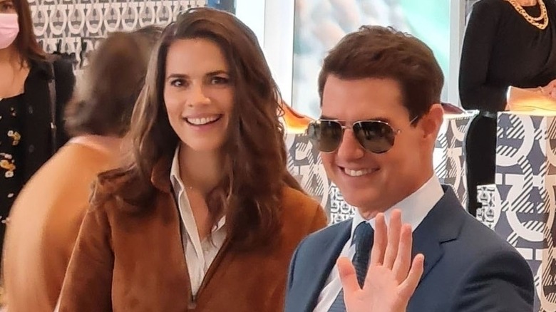 Hayley Atwell and Tom Cruise both smiling