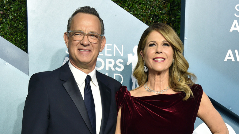 Tom Hanks and Rita Wilson smiling on the red carpet