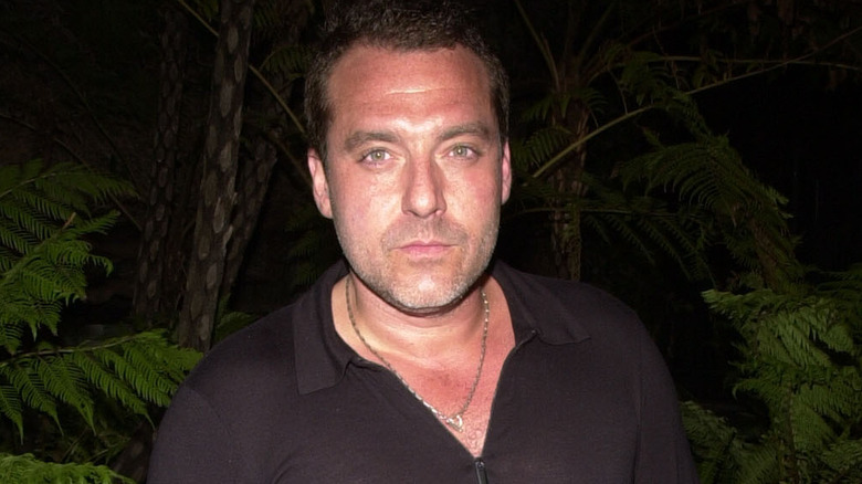 Tom Sizemore posing