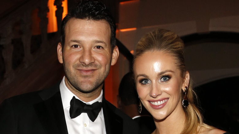 Tony and Candice Romo at an event