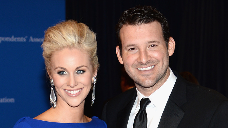 Candice Romo and Tony Romo at an event