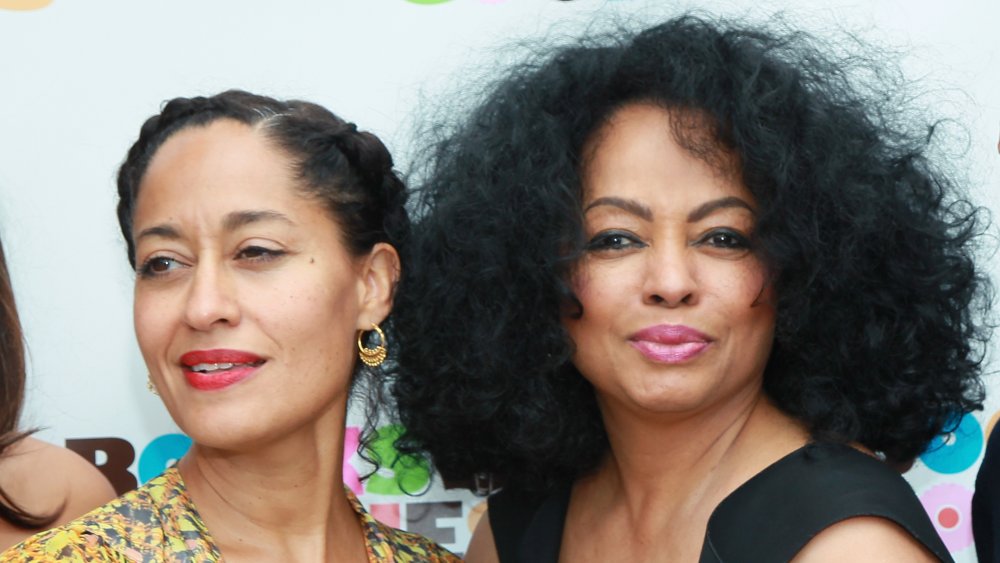 Tracee Ellis Ross in a yellow floral dress, Diana Ross in a black dress