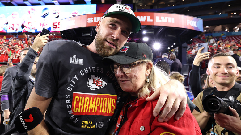 Travis and Donna Kelce embracing after his Super Bowl win