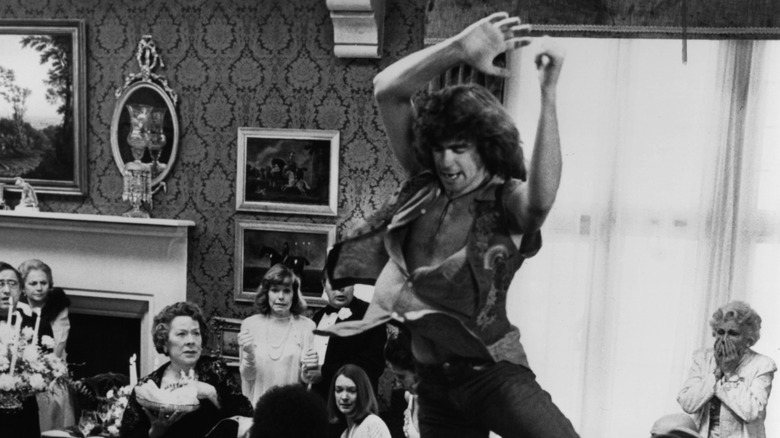 Treat Williams dancing in "Hair"