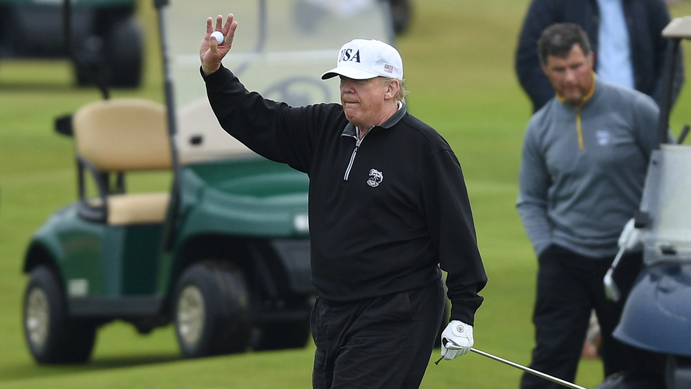 Donald Trump playing golf