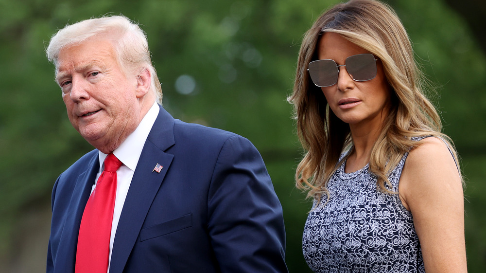 Donald Trump and Melania Trump walking