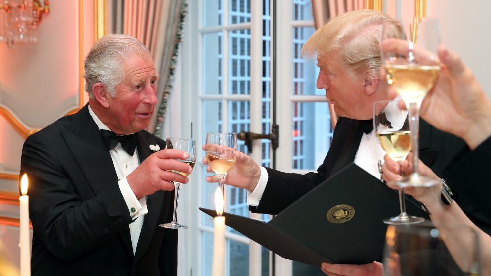 Prince Charles and Donald Trump having a toast