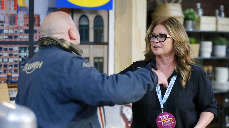 Duff Goldman with Valerie Bertinelli going for a hug