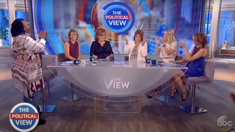 Whoopi Goldberg applauding Ana Navarro