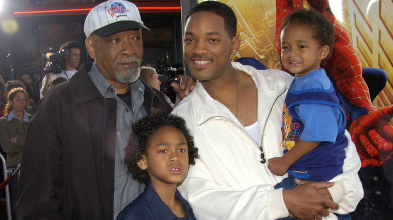 Will Smith, Will Smith Sr., Willow and Jaden at a 90s movie premiere