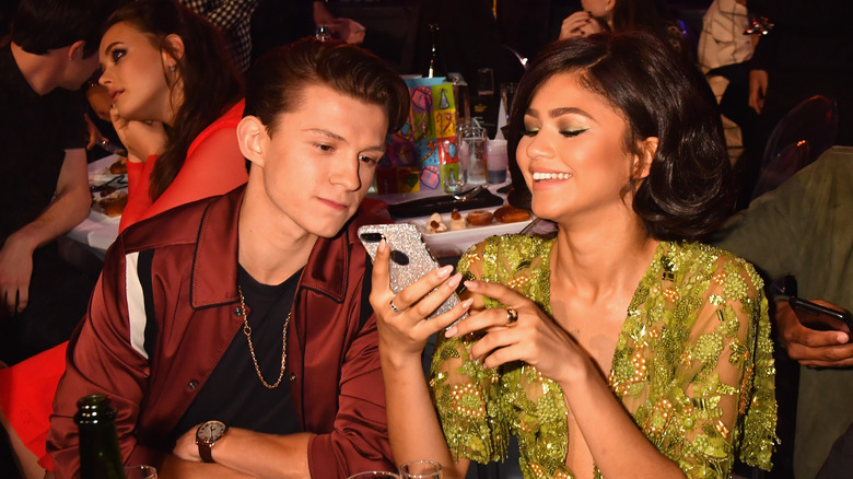 Tom Holland and Zendaya on phone