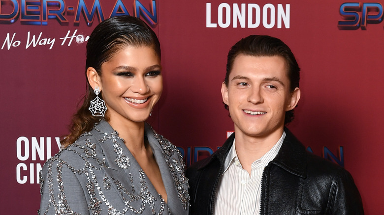 Zendaya and Tom Holland grinning