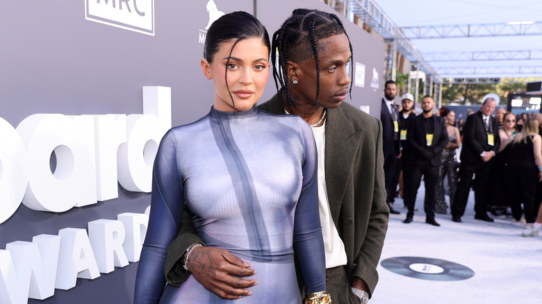 Travis Scott and Kylie Jenner posing