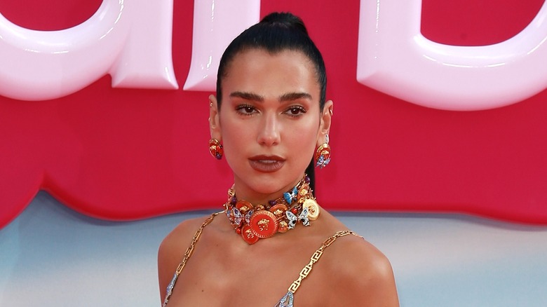 Dua Lipa posing at the Barbie premiere 