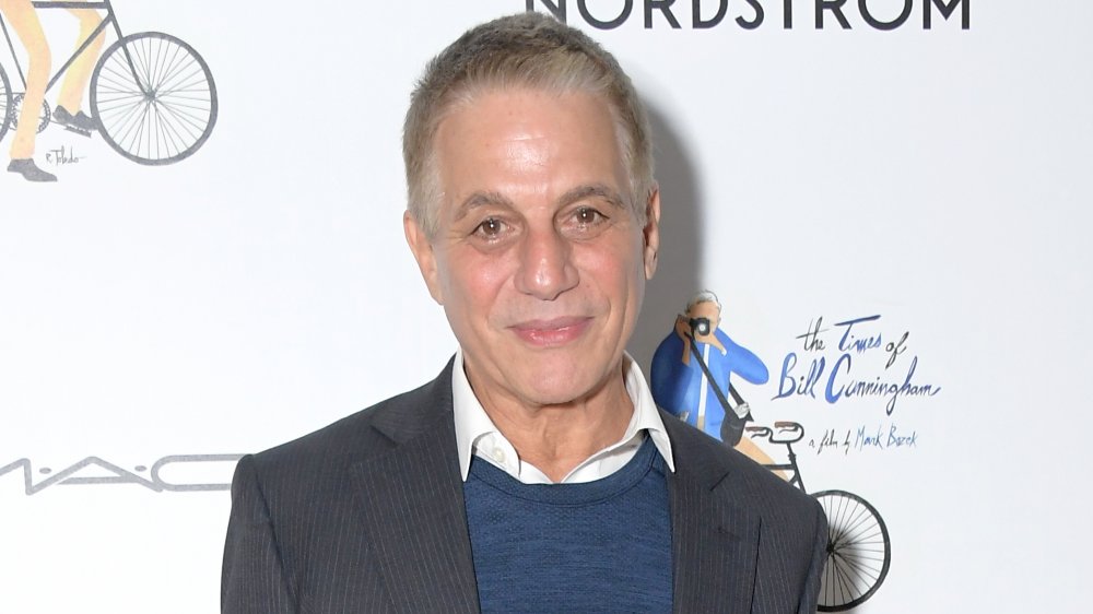 Tony Danza smiling in front of Nordstrom wall