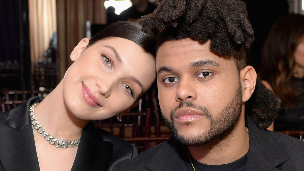 Bella Hadid and The Weeknd sitting together