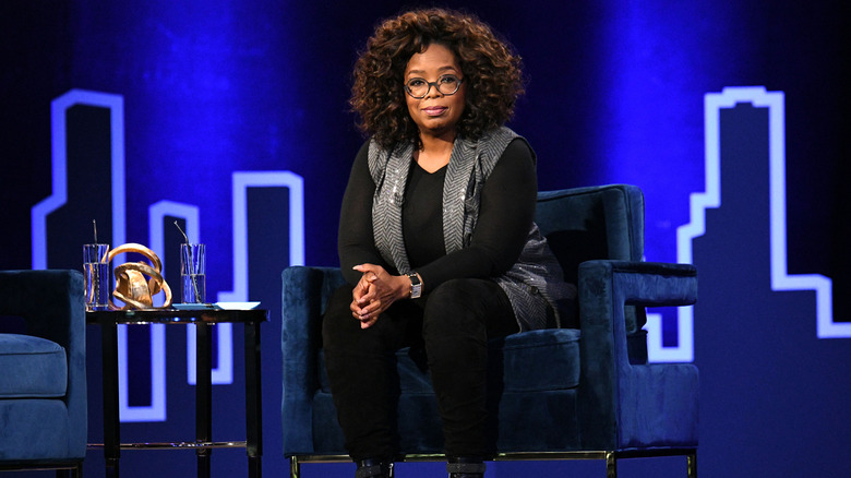 Oprah Winfrey speaking onstage during Oprah's SuperSoul Conversations