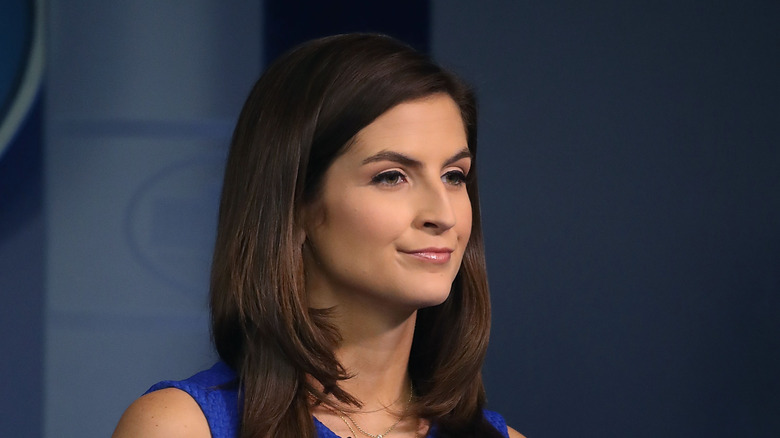 Kaitlan Collins in blue dress