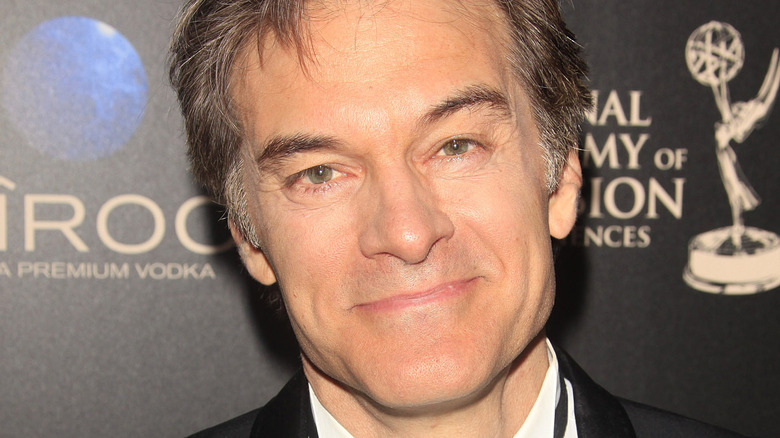 Dr. Oz with tight-lipped smile