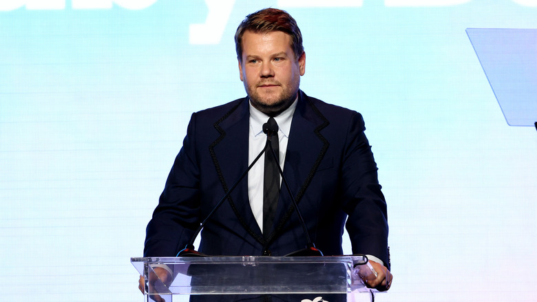 James Corden speaks on stage