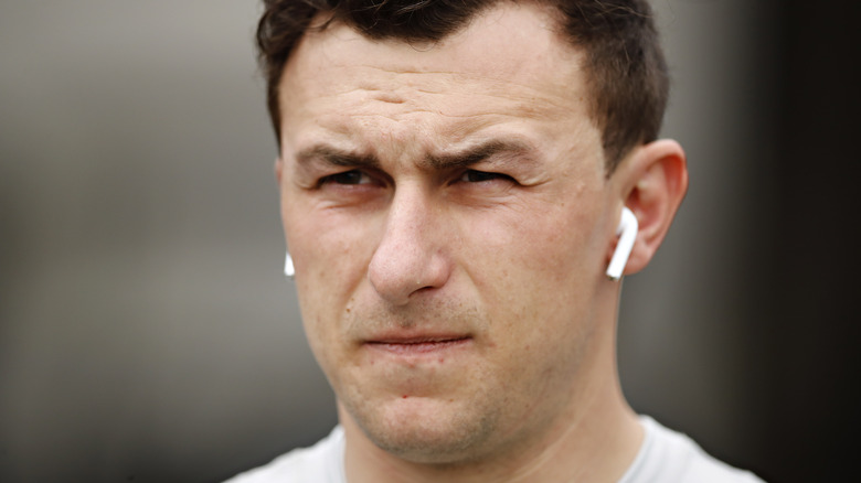 Johnny Manziel not smiling AirPods