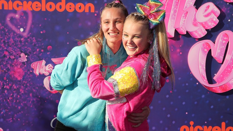 Jojo Siwa and Kylie Prew smiling