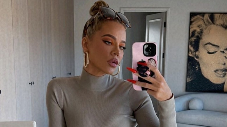 Khloe Kardashian poses for a mirror selfie