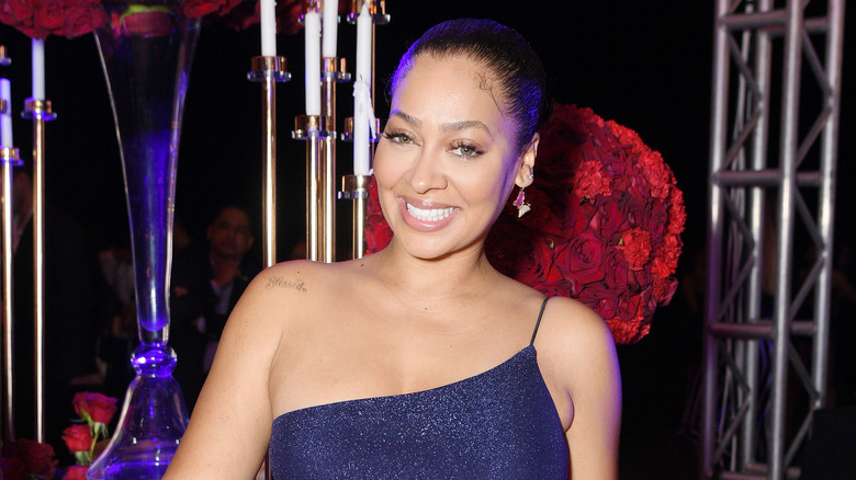 La La Anthony smiling