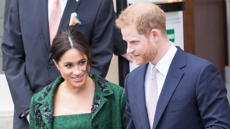 Meghan Markle and Prince Harry smiling in 2019