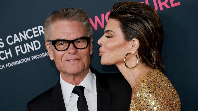 Lisa Rinna kissing Harry Hamlin