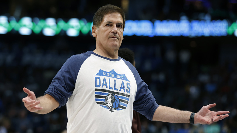 Mark Cuban holding out hands