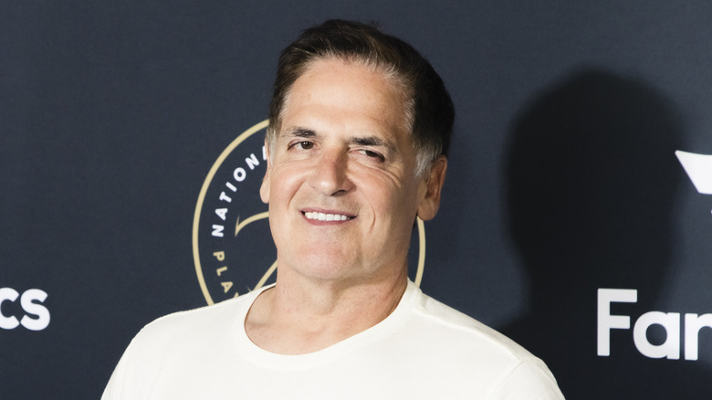 Mark Cuban smiling white T-shirt