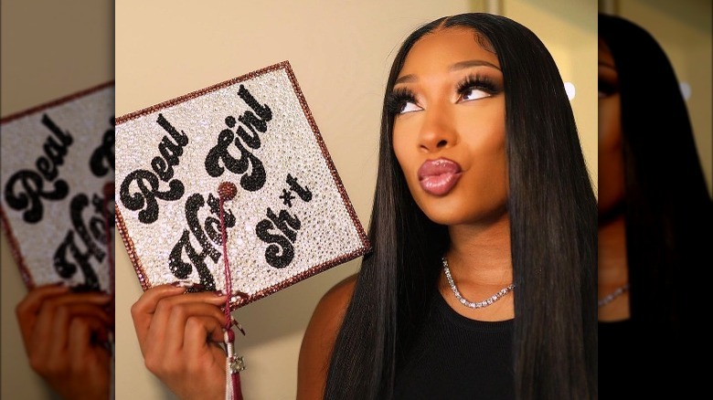 Megan Thee Stallion holding her graduation cap