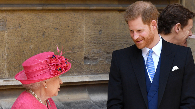 Queen Elizabeth and Prince Harry talking