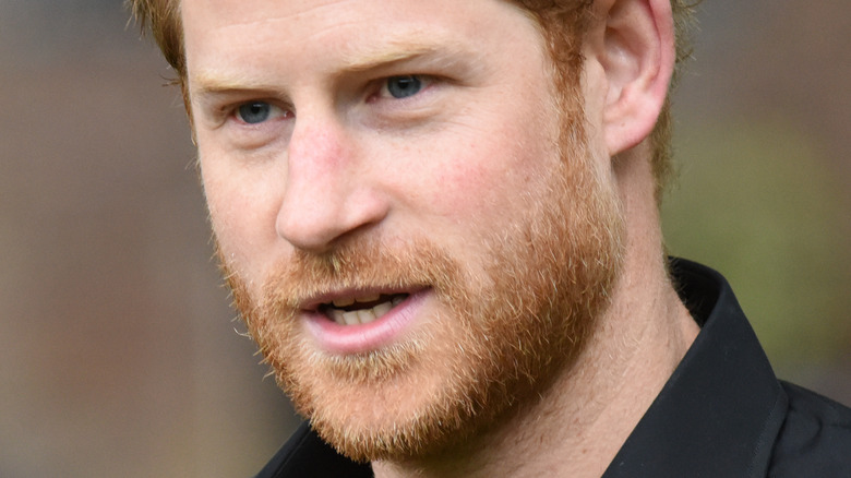 Prince Harry wearing black shirt