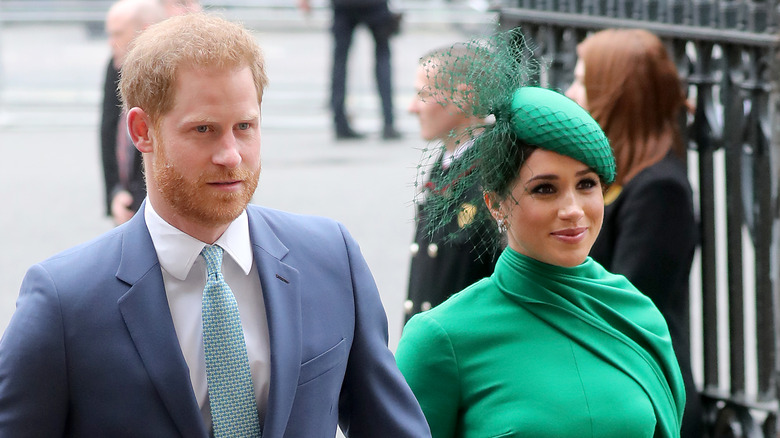 Prince Harry and Meghan Markle hold hands 