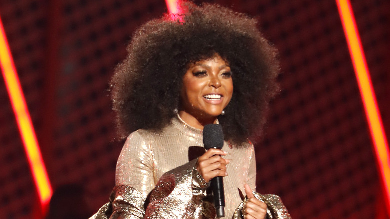 Taraji P. Henson holding a microphone