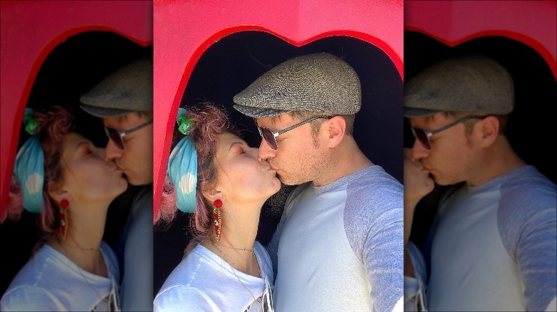 J.D. Scott and Annalee Belle Dunn kiss