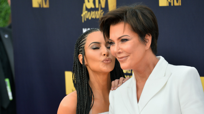 Kim Kardashian kisses Kris Jenner on the cheek