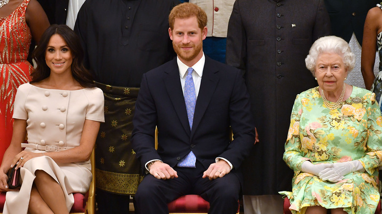 Meghan Markle, Prince Harry, Queen Elizabeth sitting