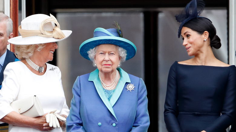 Camilla Parker Bowles, Queen Elizabeth, and Meghan Markle