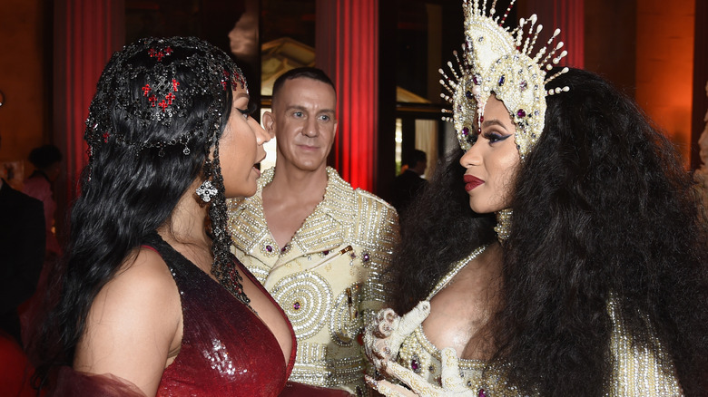 Nicki Minaj, Designer Jeremy Scott, and Cardi B attend the Heavenly Bodies: Fashion & The Catholic Imagination Costume Institute Gala