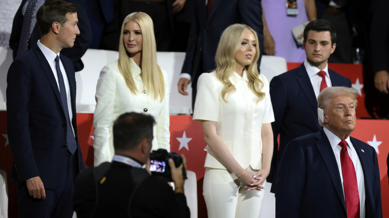 Jared Kushner, Ivanka Trump, Tiffany Trump and Michael Boulos standing behind Donald Trump at the 2024 RNC.