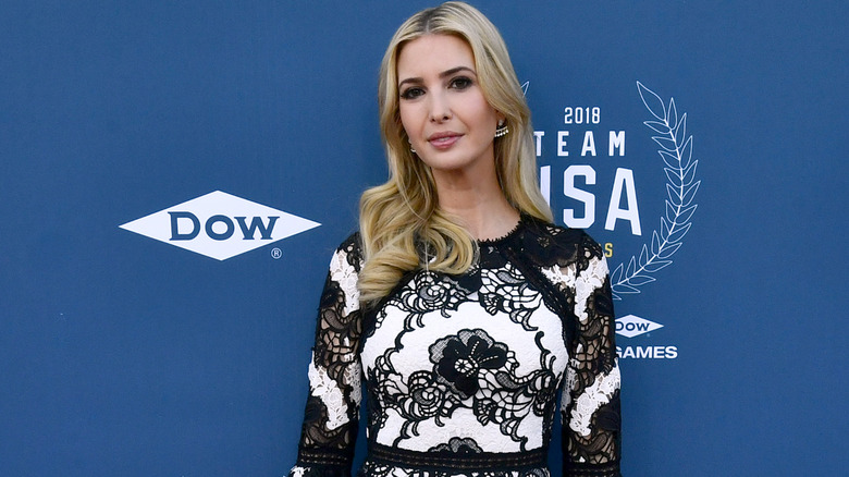 Ivanka Trump wearing a white and black lace dress at an event