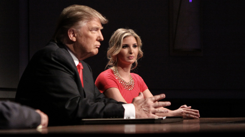 Donald and Ivanka Trump listen 