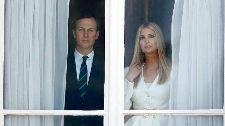 Jared Kushner, Ivanka Trump looking out window